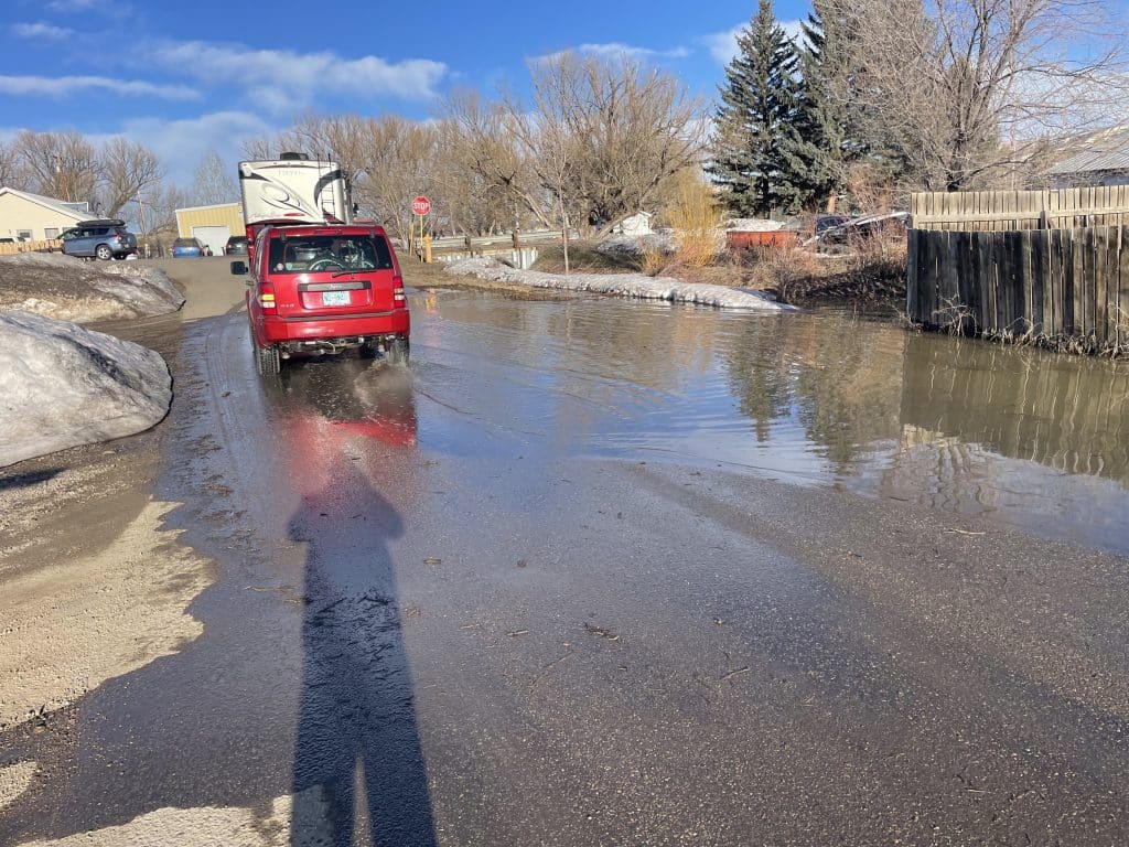 PHOTOS Flooding causes closures in Hayden